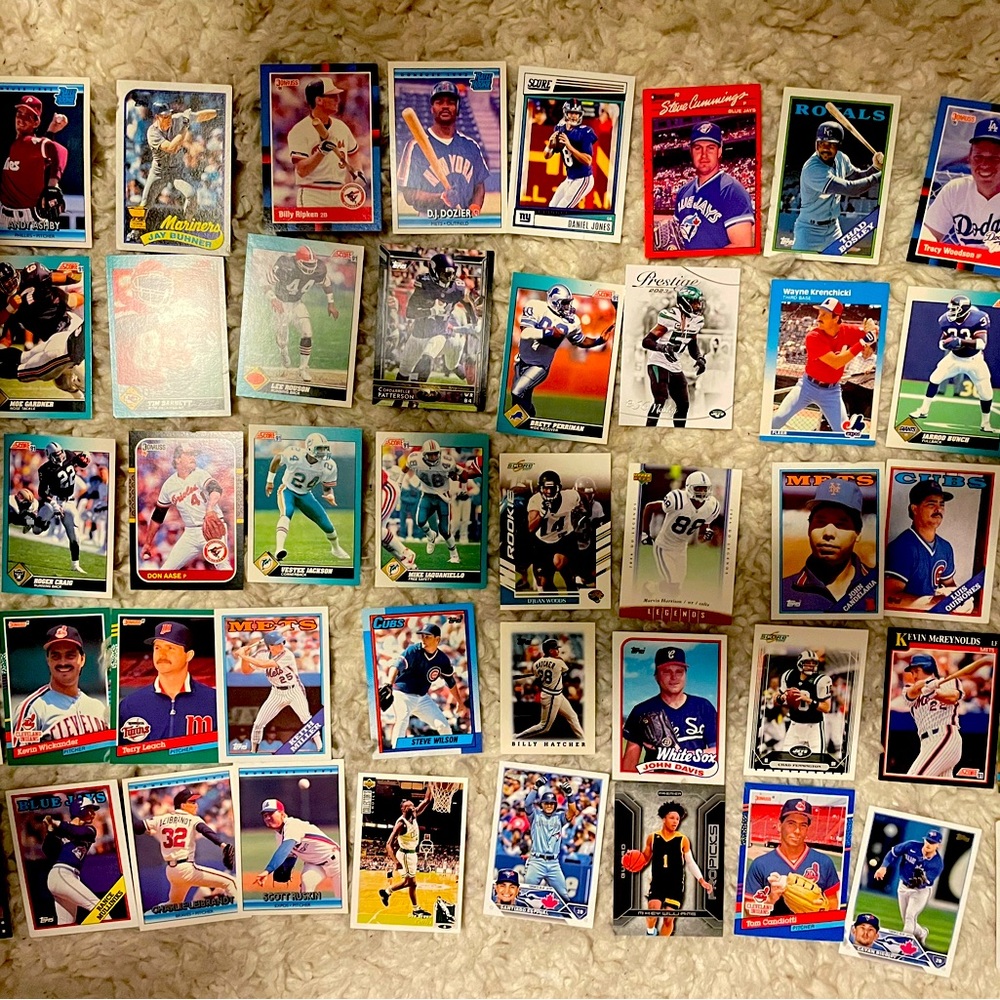 assortment of sports cards (baseball & football)